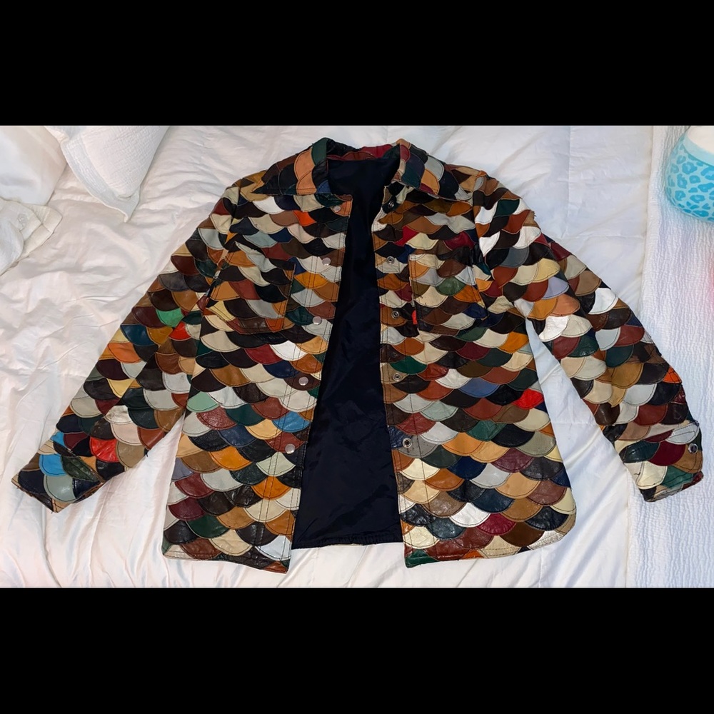 Patchwork / scalloped leather jacket